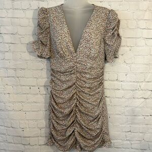 SBetro flattering ruched dress with low V